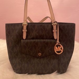 MK brown logo tote. Gently used. Some signs of wear.